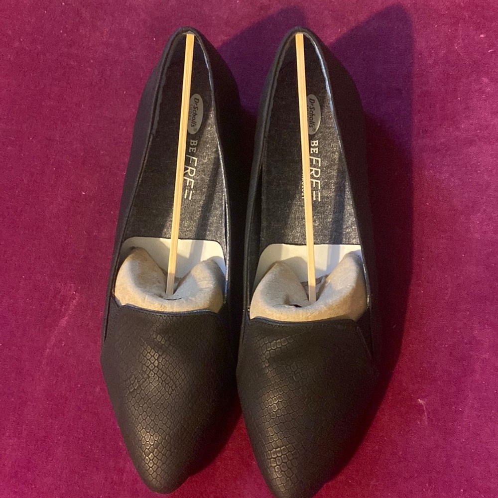 Black snake print flats.